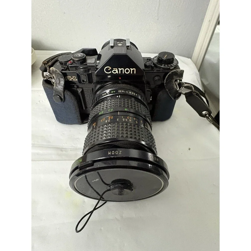 Canon A-1 35mm Film Camera with toyo optics 28mm 1:3.5 Lens and F=28-80  Tested
